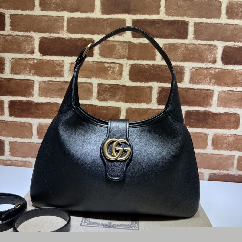 G*u*i top handle bags